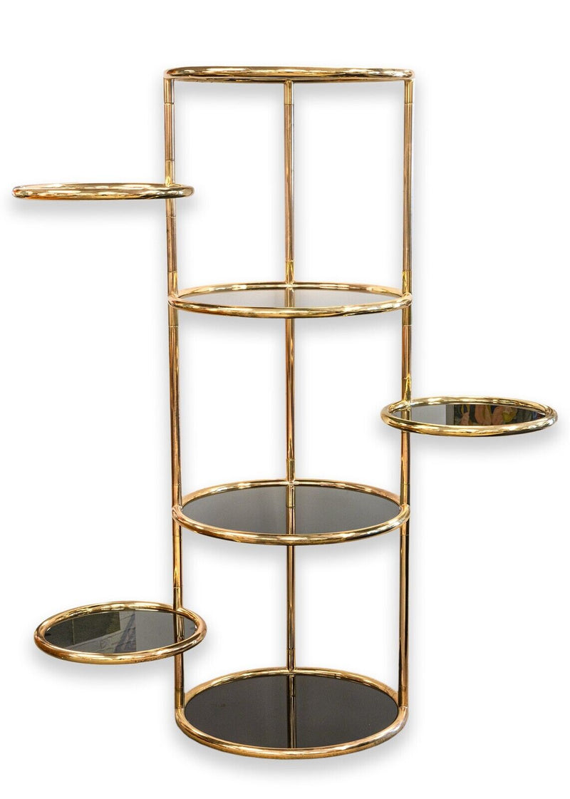 Milo Baughman Seven Tiered Round Brass and Smoked Glass Swivel Etagere Shelving