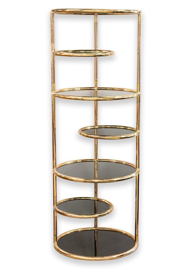 Milo Baughman Seven Tiered Round Brass and Smoked Glass Swivel Etagere Shelving