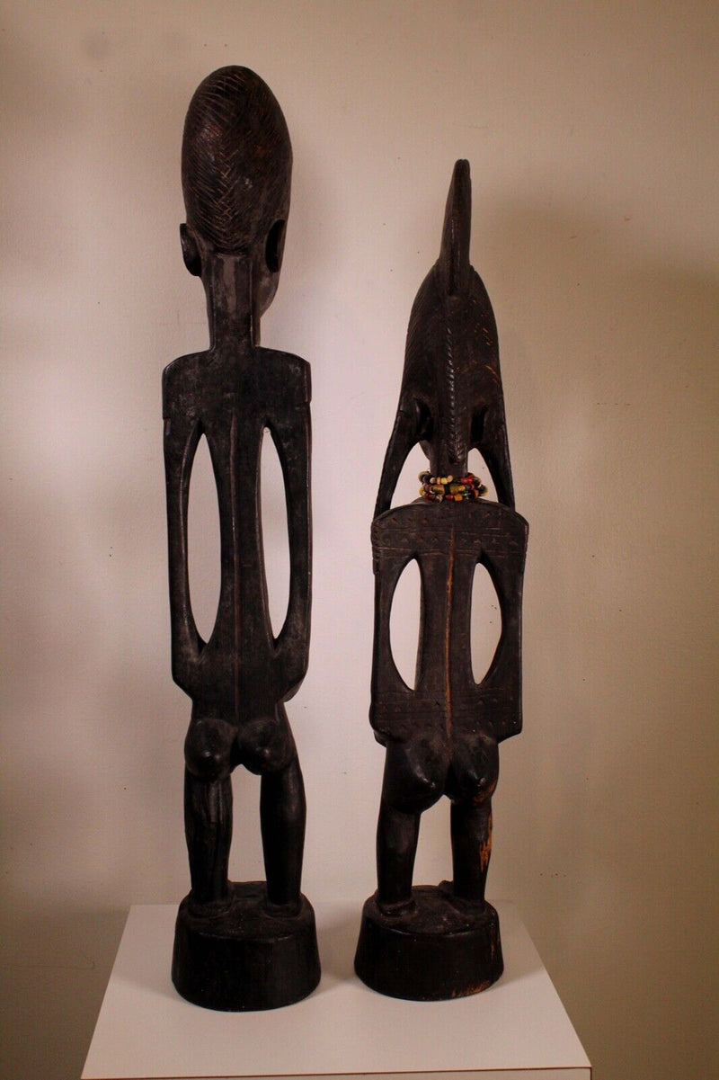 Pair of African Wood Carvings Standing Male and Standing Female with Beaded Neck