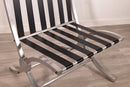 Pair of Art Deco Aluminum and Black Barcelona Style X Framed Sleek Lounge Chairs