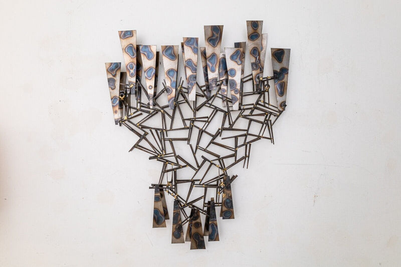 Marc Weinstein Creates Plutonic Brutalist Torch Cut Wall Sculpture