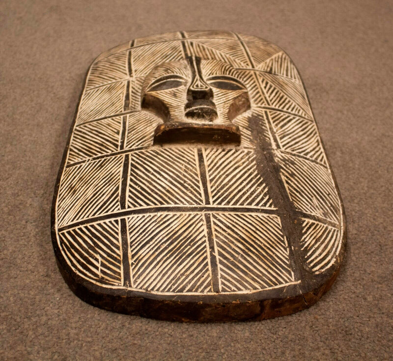 Vintage Large African Relief Carved Shield Mask Sculpture