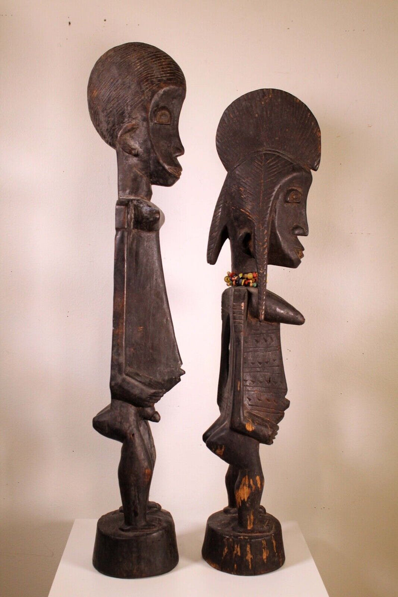 Pair of African Wood Carvings Standing Male and Standing Female with Beaded Neck